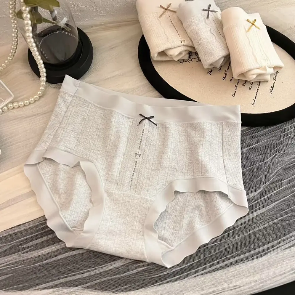 女士中腰棉抑菌底裆亲肤舒适透气无痕提花大包臀三角内裤