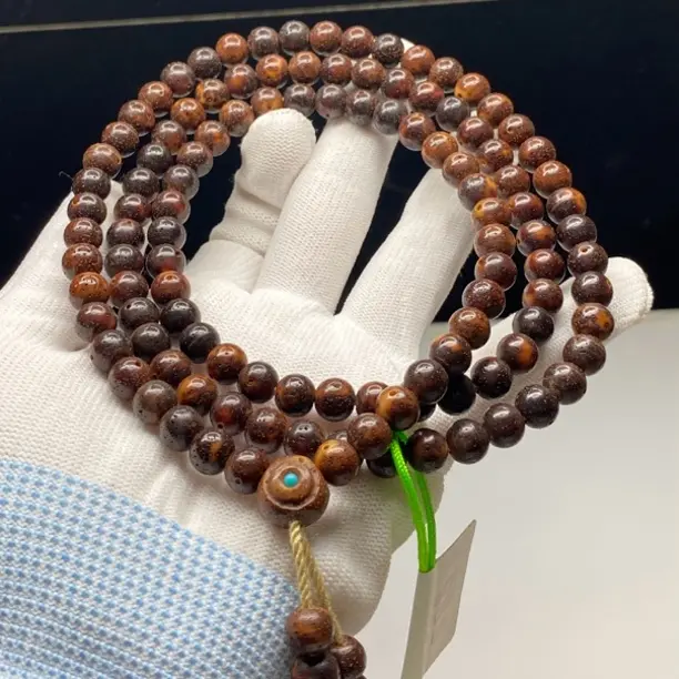 海南原生态黑金虎皮8圆高油高密长串108老籽DD23