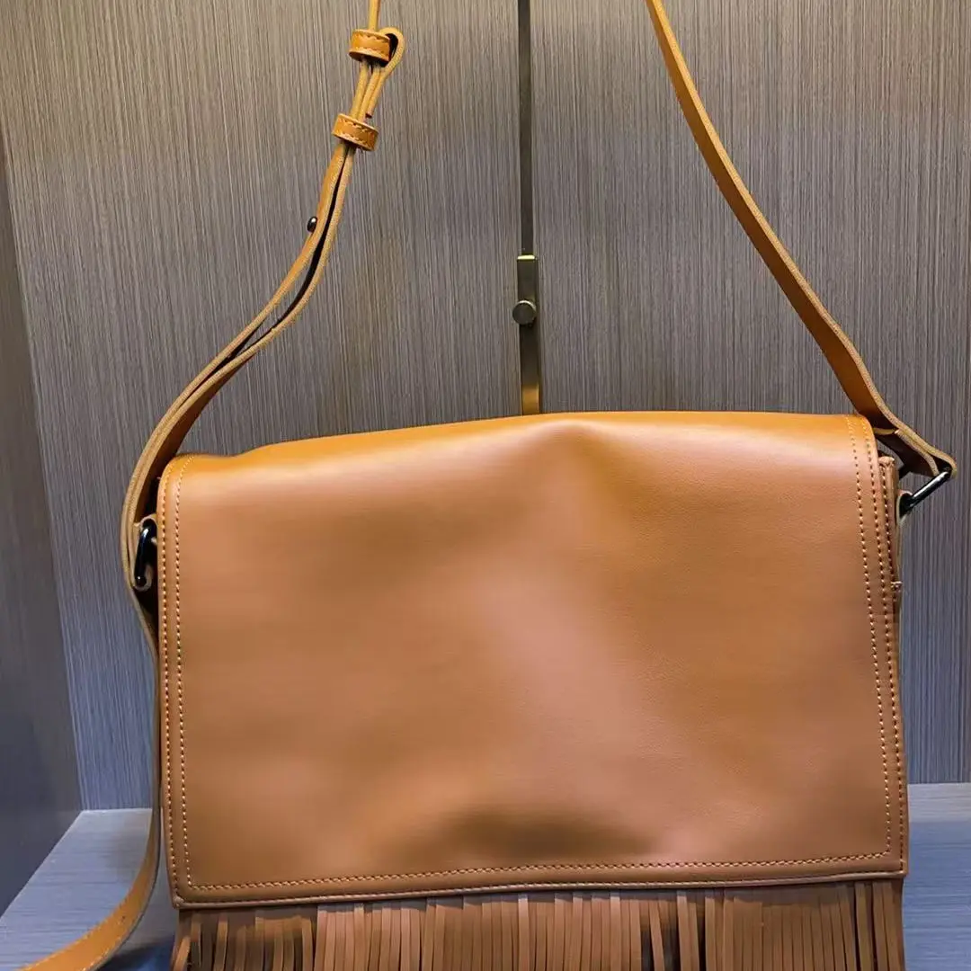 女士中号小众流苏款手机包经典翻盖腋下包9166