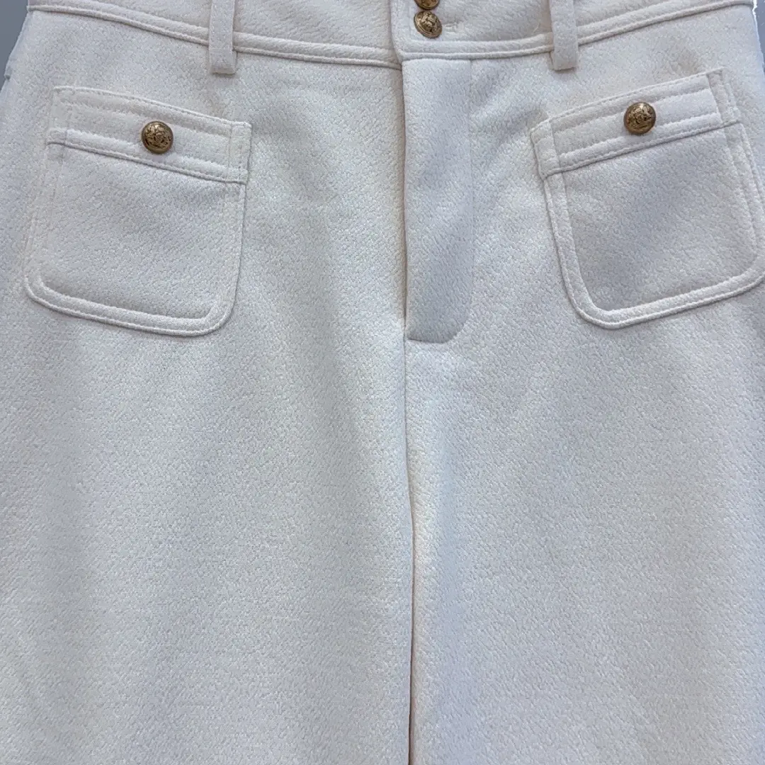 秋季新款高腰显瘦不贴腿微喇金扣贴袋牛仔裤