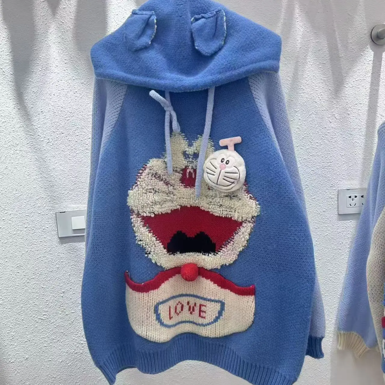 女连帽针织叮当猫百搭毛衣带帽少女风休闲保暖