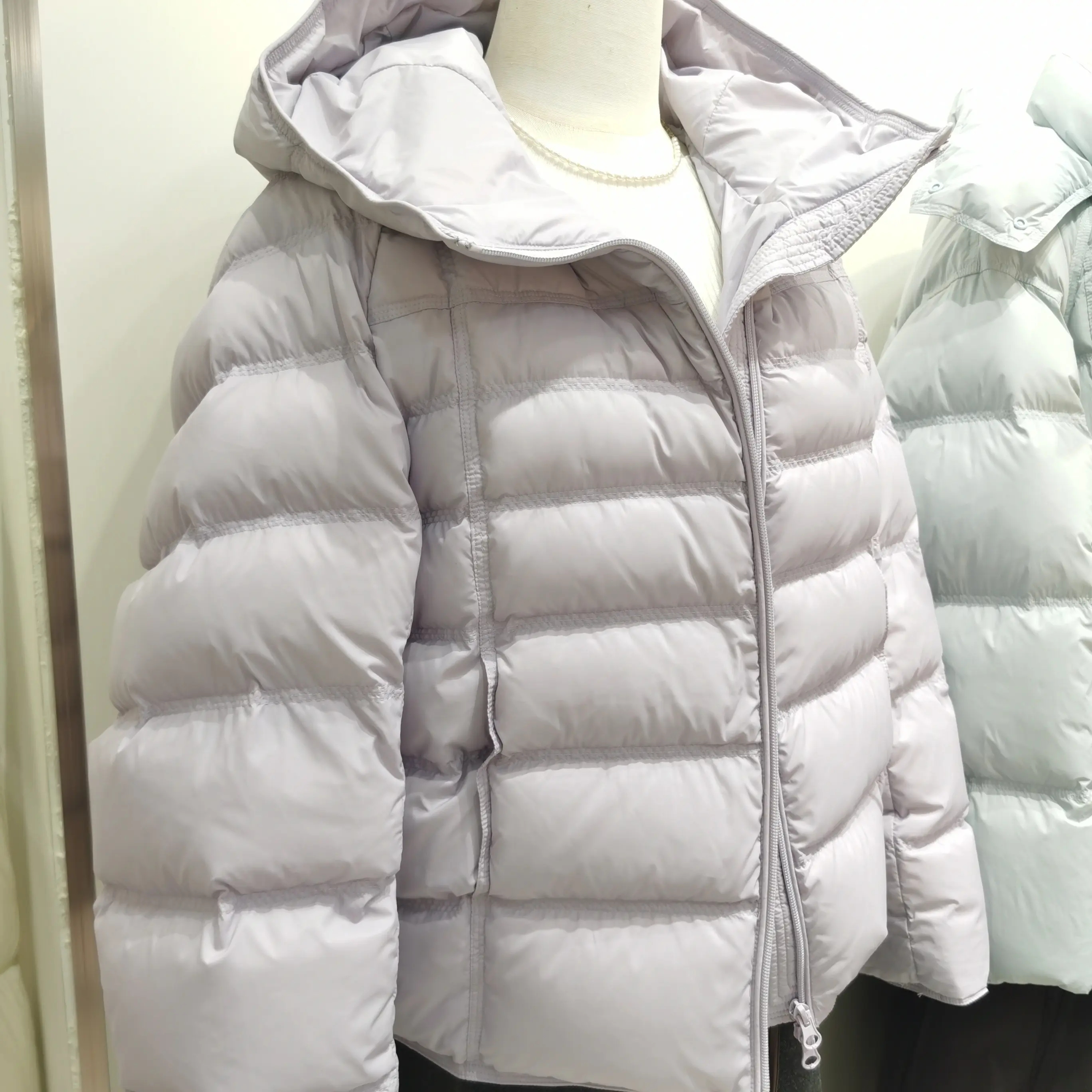 香港一诺美人尖排骨款连帽白鸭绒短款冬季新款出绒换新三年质保