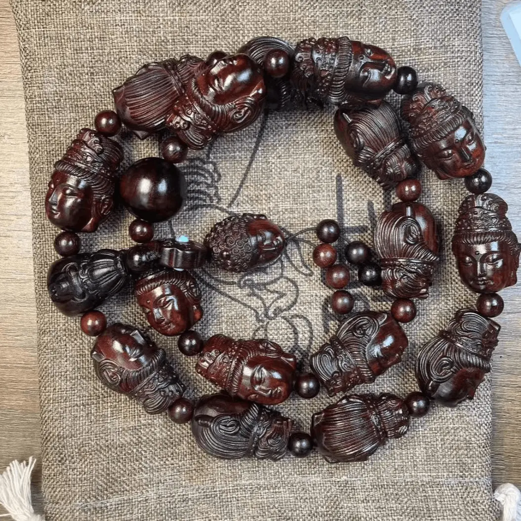 卢氏黑黄檀观音手持单颗尺寸3.0cm