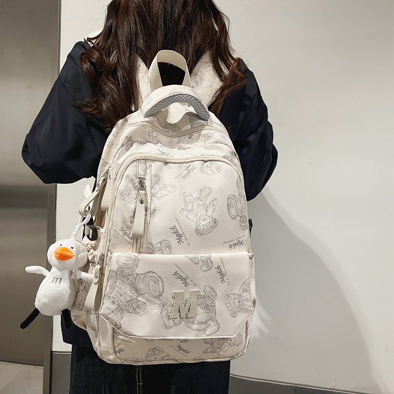 书包女生大学生高中学生背包初中生小学生大容量旅行减负双肩包男