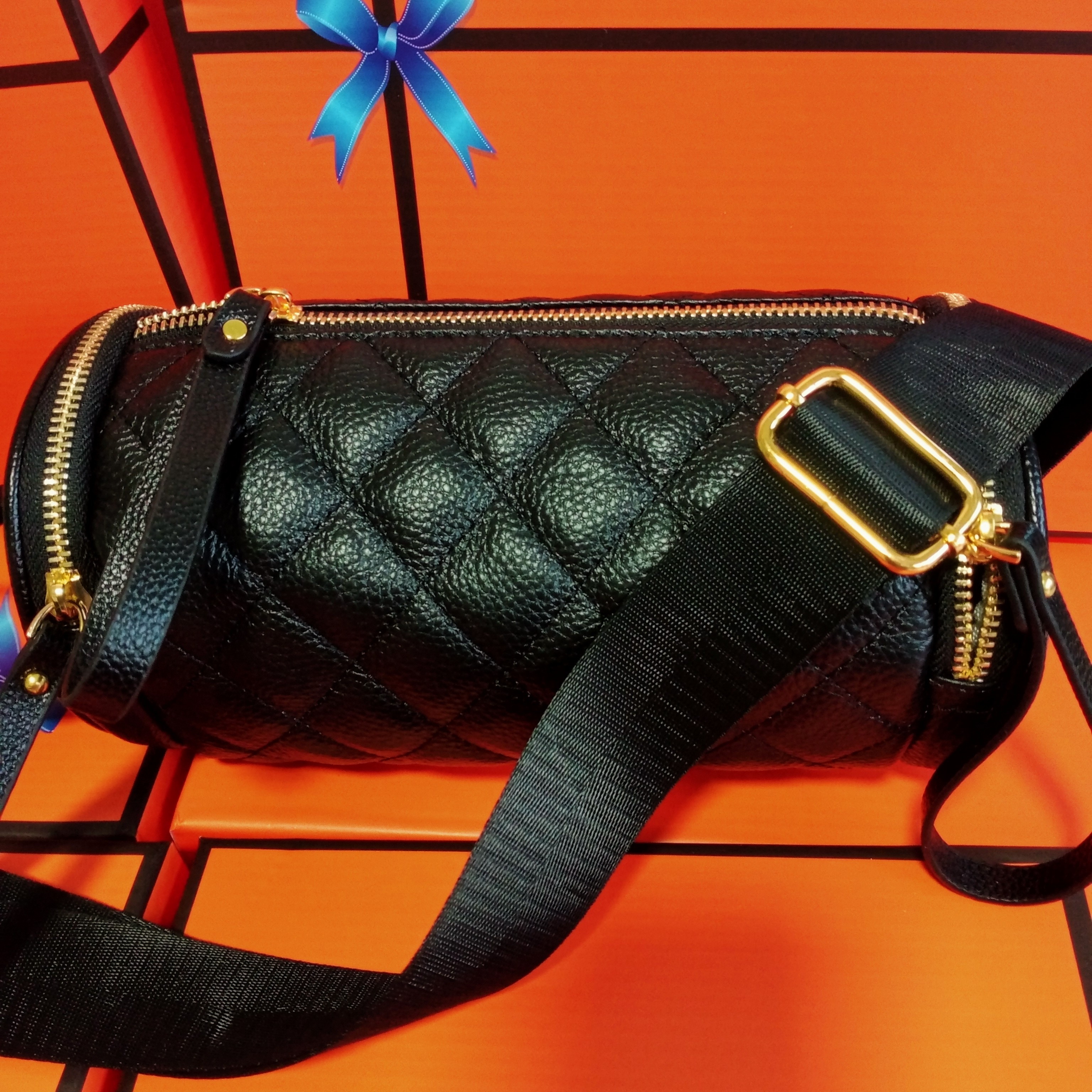 头层牛皮女包新款菱格休闲圆筒枕头包百搭轻奢单肩美包女2118