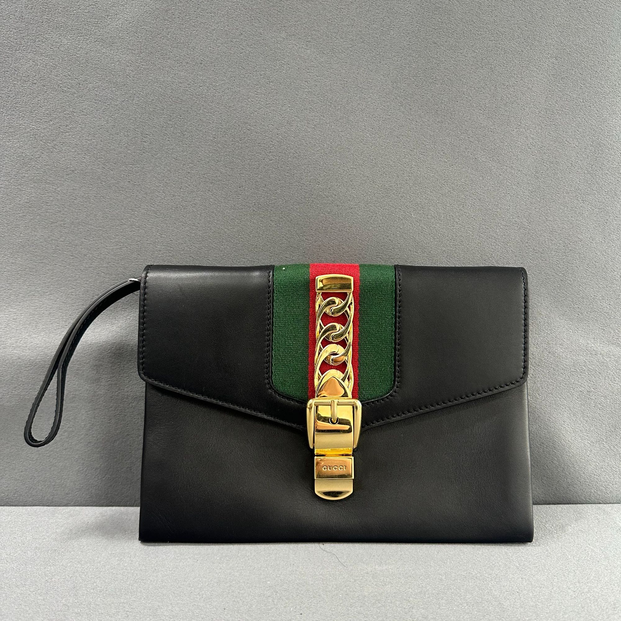 95新 GUCCI/古驰 95新 拾锦奢品 古驰塞尔维亚黑金手拿包