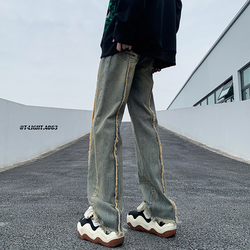 水洗做旧牛仔裤男秋冬季设计感高级美式高街潮流宽松直筒毛边裤子
