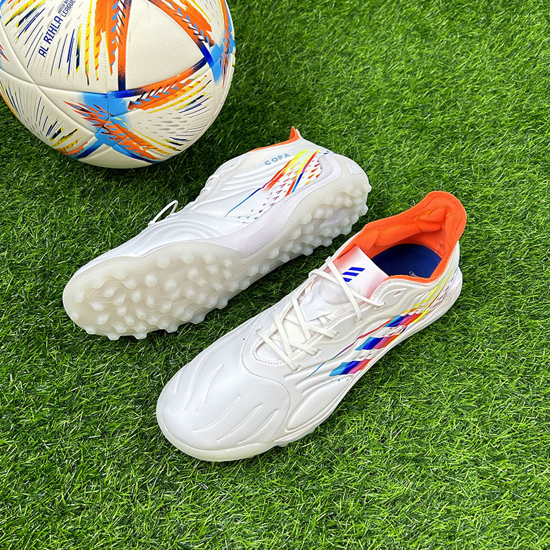 xiangzu/翔足copa袋鼠皮足球鞋人工草地学生用男女短钉透气防滑比
