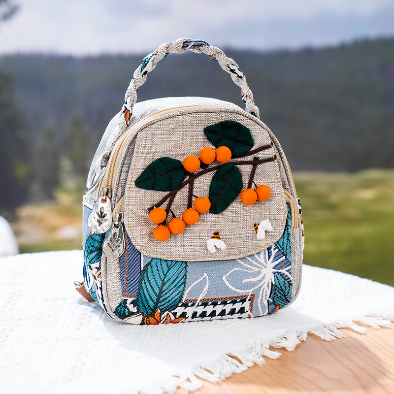 一抹异彩迷你小双肩包女斜挎单肩胸包多功能编织柿柿如意轻便背包