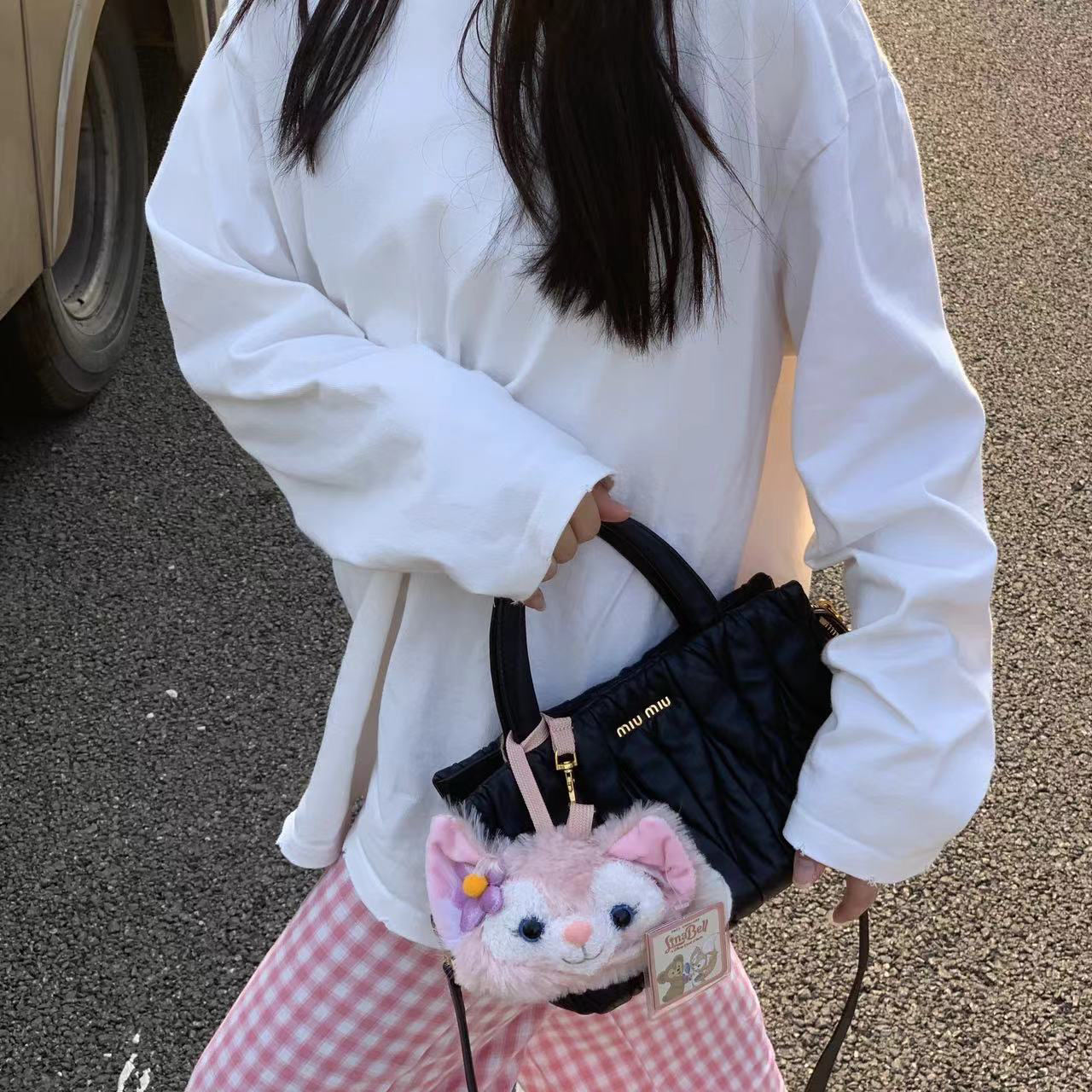 95新 MIU MIU/缪缪 缪缪黑金小泡芙手提斜挎包D0967/D1159