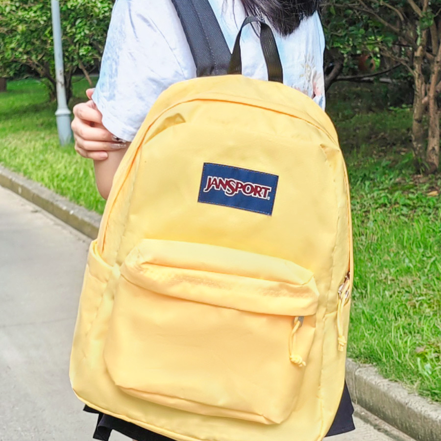 Jansport23年新款奶黄色学生书包电脑旅行包EW8