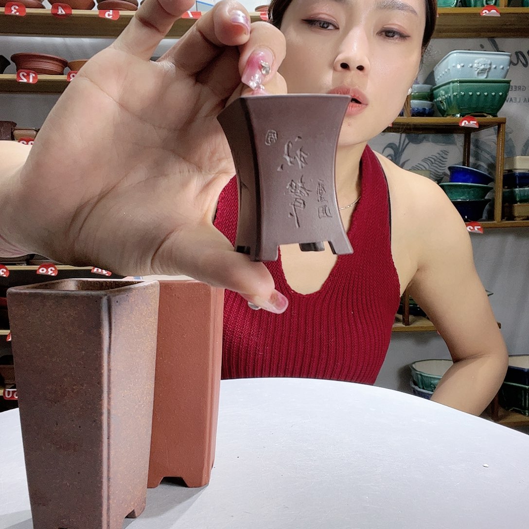紫砂花盆手工雕刻