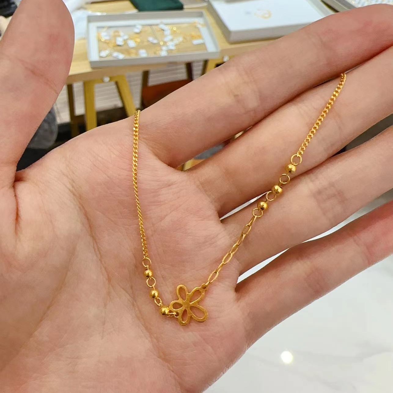 宝裕华黄金足金999 格桑花手链