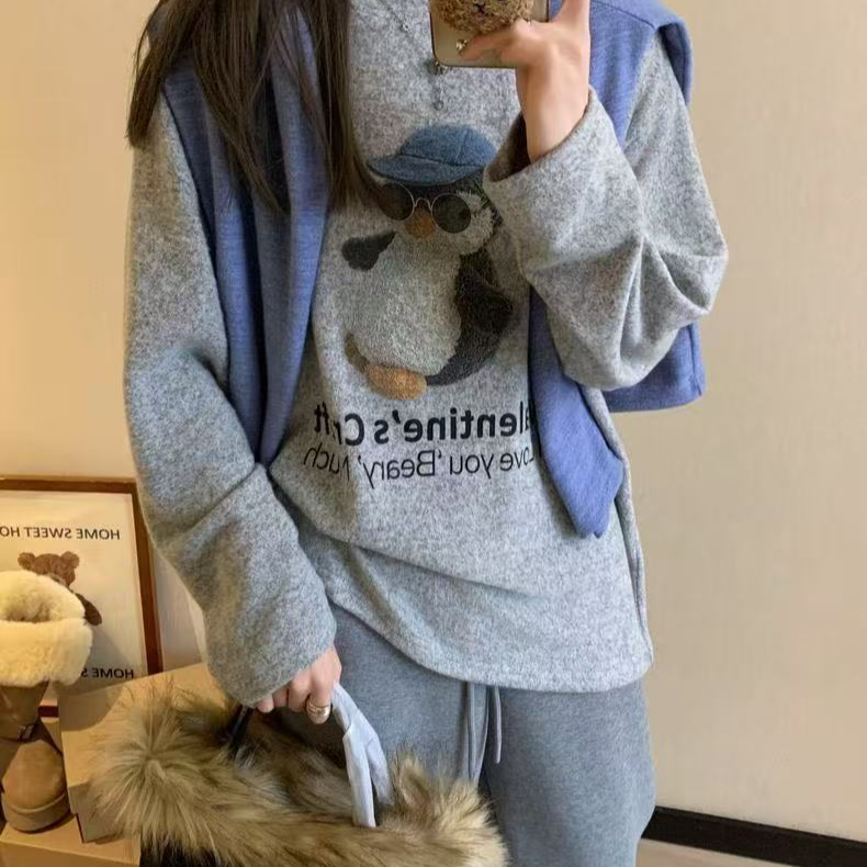 蓝帽墨镜小企鹅印花打底衫