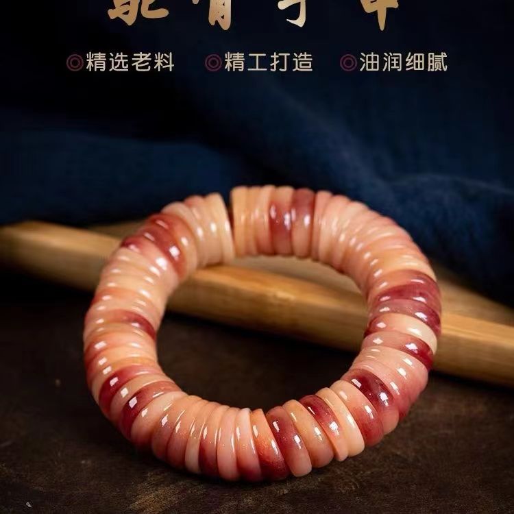 驼骨雕刻大肠樱桃红单圈手串