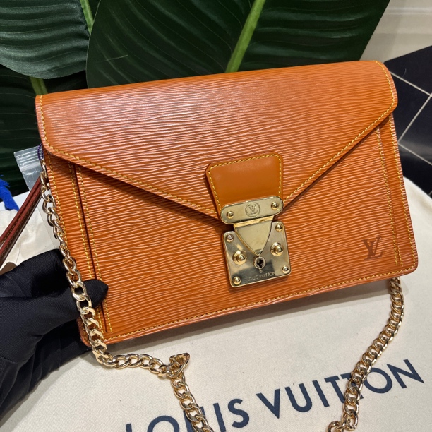95新 LouisVuitton/路易威登 橙色水波纹手蒙梭拿包斜挎包