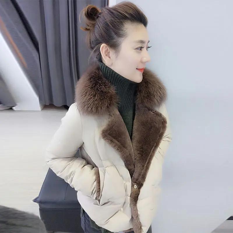冬装女2023新款欧货大毛领翻领修身时尚轻薄茧型羽绒